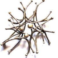 silver spikey abstract brooch