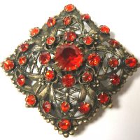 red filigree brooch small