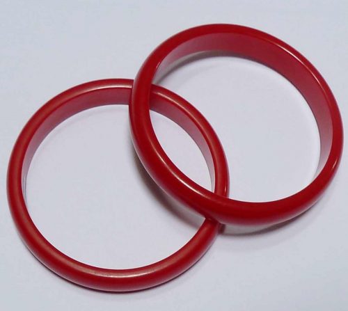 2 red bakelite bangles