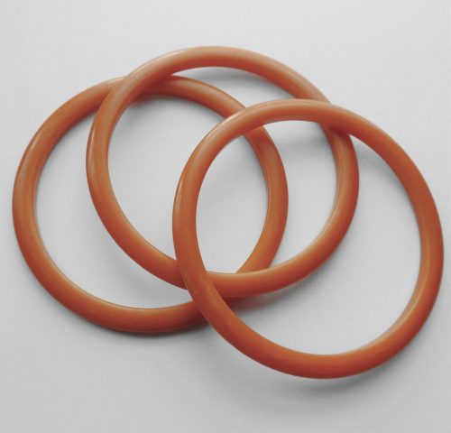 3 ornge bakelite spacer bangles