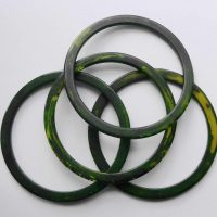 4 green bakelite spacer bangles