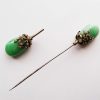 Czech Deco green stone jabbo pin
