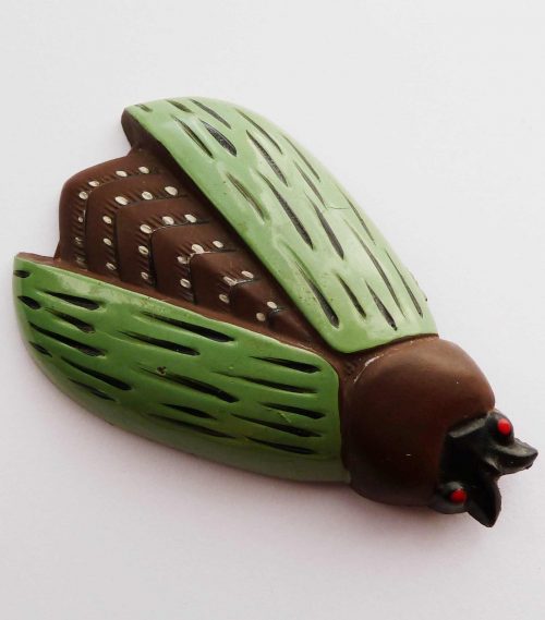 brown green bug clip celluloid