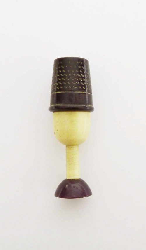 celluloid sewing thimble container back