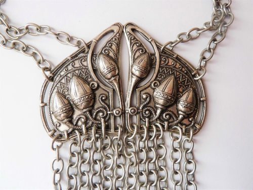 white metal vintage necklace on chains