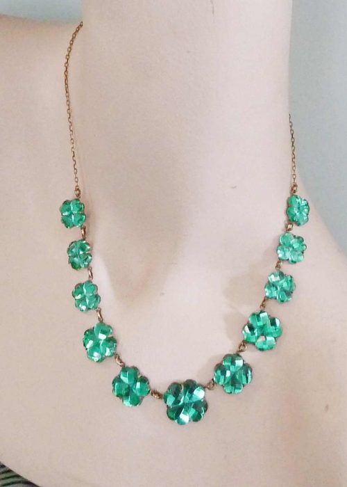 Green mirror glass necklace on dummy