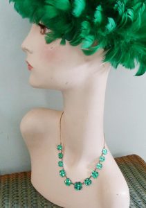 green mirror glass necklace on dummy