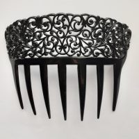 black celluloid hair comb