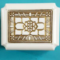 Warner cream celluloid ring box top