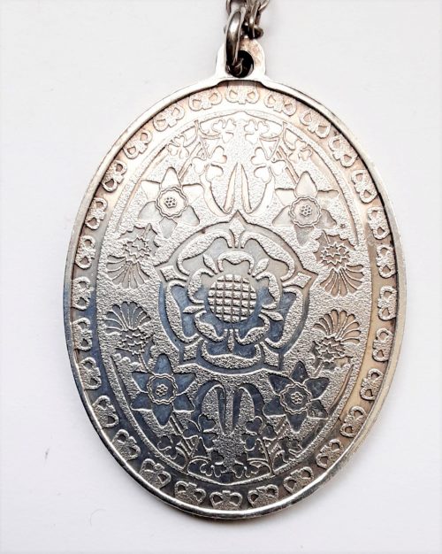 silver jubilee pendant back