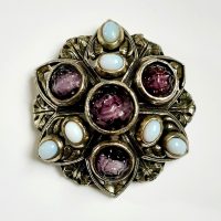 Miracle mauve stones brooch