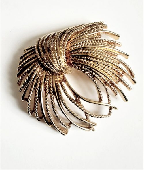 Monet gold tone brooch