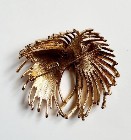 Monety gold tone brooch back