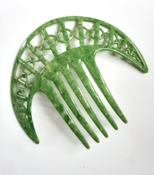 green celluloid hair comb