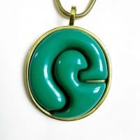 Cardin green gilt pendant closeup