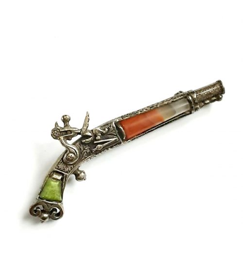 Miracle pistol brooch