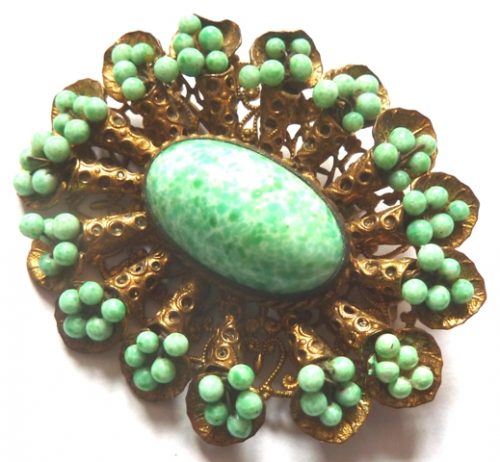 Neiger brooch green beads on wire